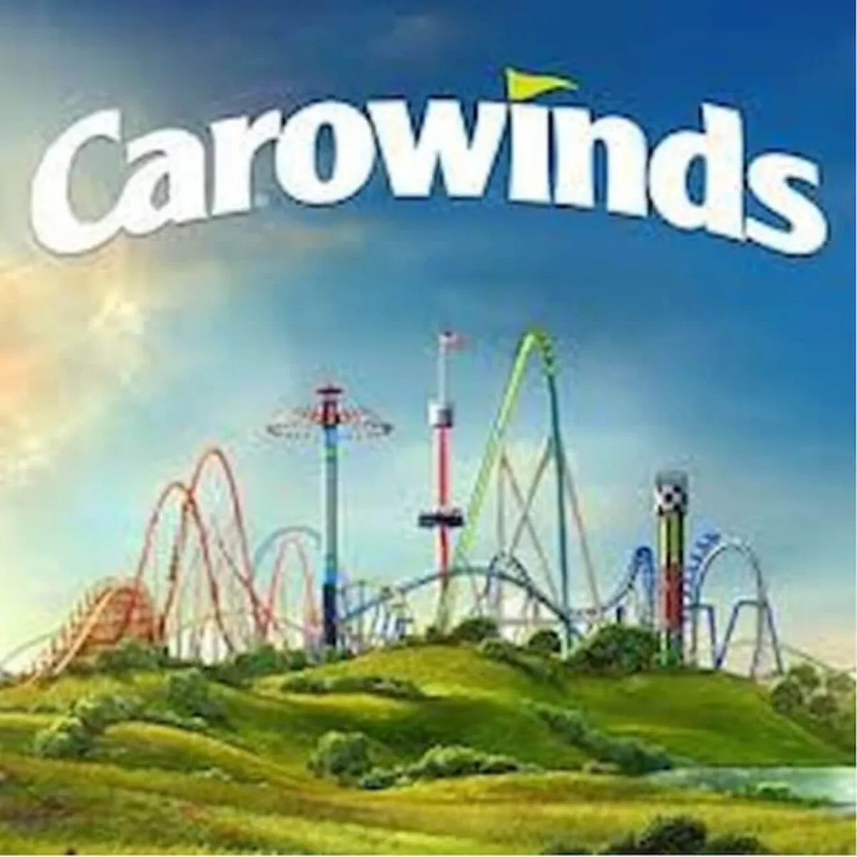 A lively exterior view of Carowinds amusement park, featuring dramatic roller coasters, colorful rides, and happy families enjoying a sunny day. Green hills and a bright blue sky provide a cheerful backdrop, capturing the thrill and excitement of the park.