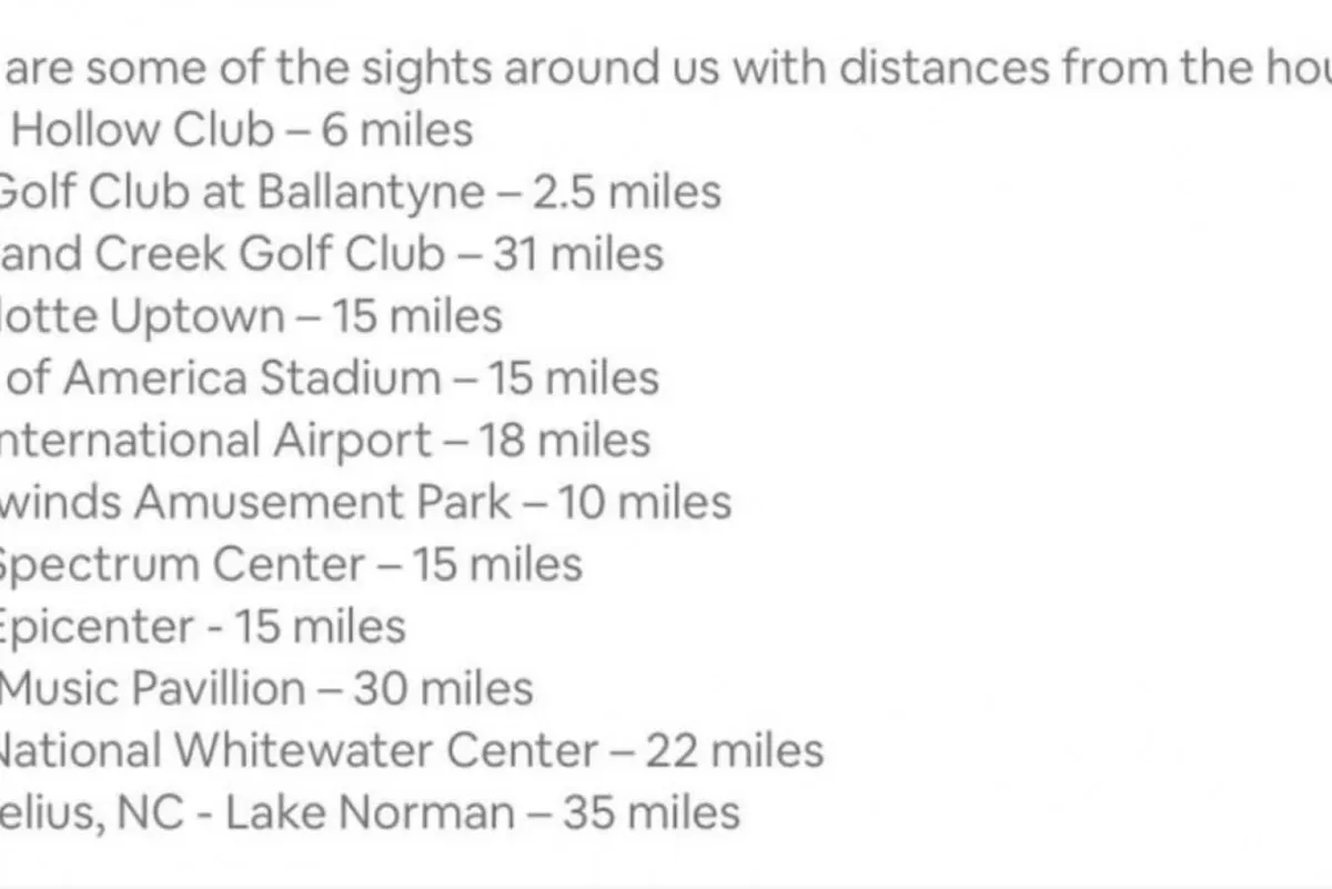 An interior image featuring a detailed list of local attractions and their distances, offering practical information for guests planning day trips and exploring Charlotte’s diverse offerings.